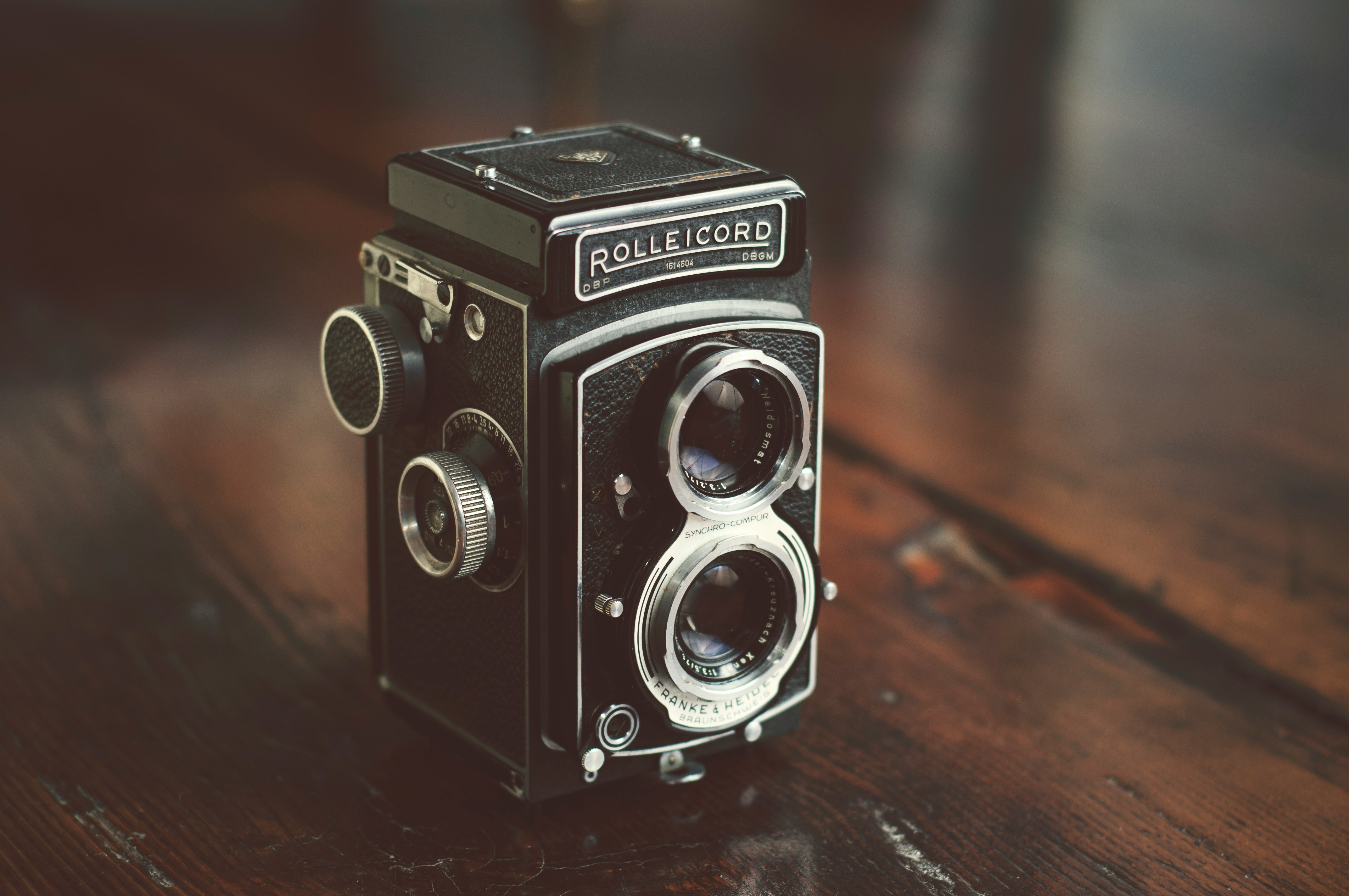 black and gray camera on table